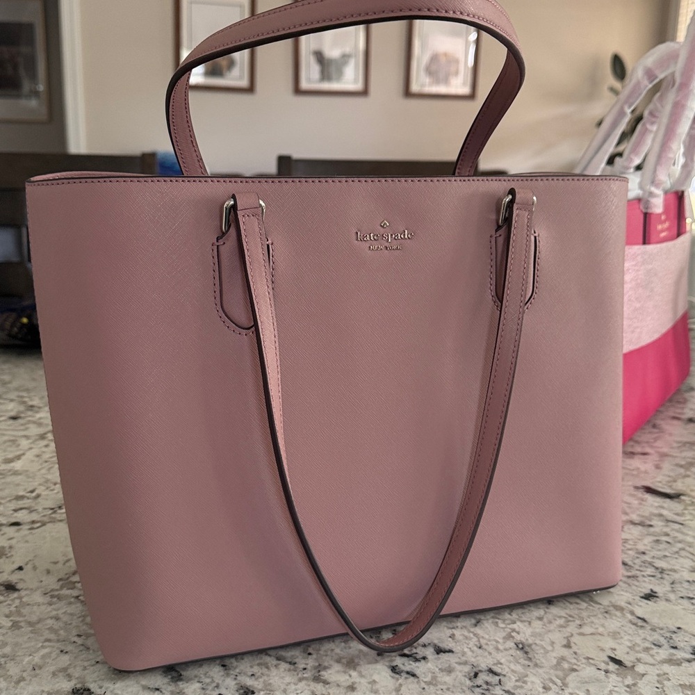 Brand New - some tags still attached Kate Spade Pastel Purple Tote

14 x 11 x 6